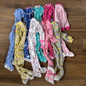 Bundle of snug fit footed pajamas - Carters & Gerber l!
